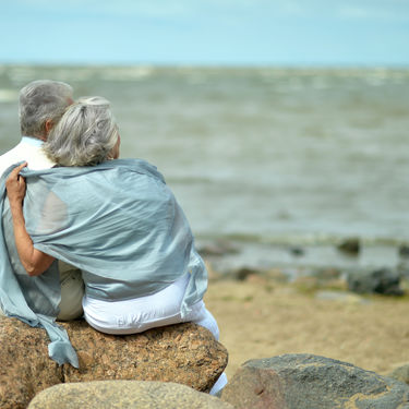 Couple on beach shutterstock 273001520